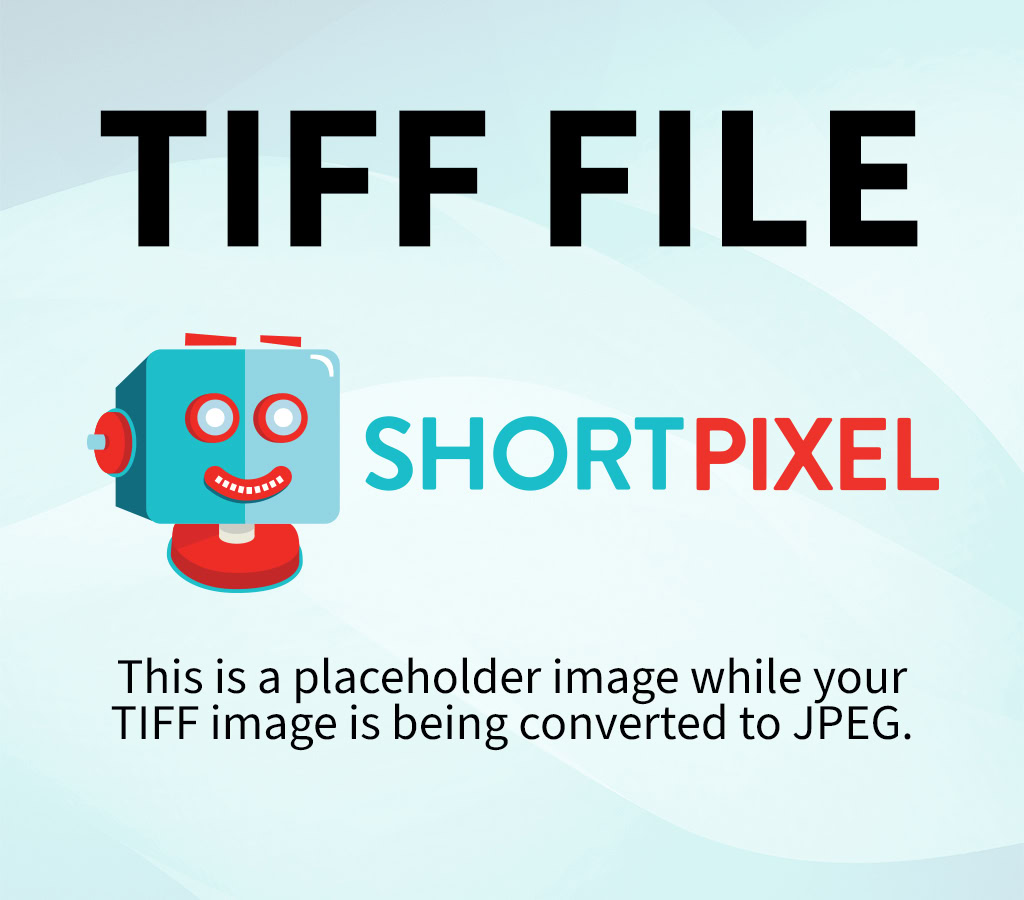 Black woman sitting quietly on a couch, appearing physically at rest while still mentally overwhelmed, representing invisible mental load.